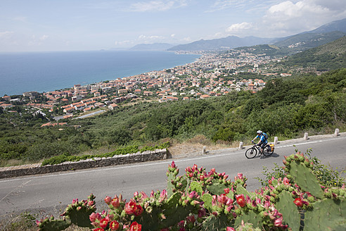 Italy, Liguria, Verezzi, Mature man riding bicycle - DSF000357