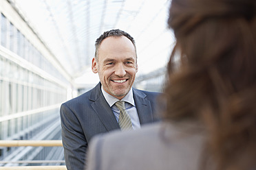 Germany, Leipzig, Business people smiling - WESTF018558