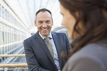 Germany, Leipzig, Business people smiling - WESTF018559