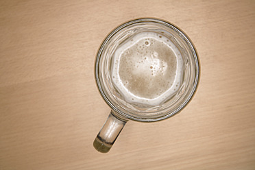 Empty beer mug on table, close up - TCF002327