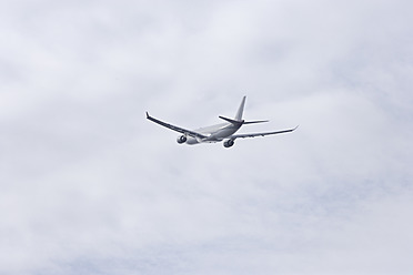 Europe, Germany, Bavaria, Commercial passenger plane after take off at Munich airport - TCF002347