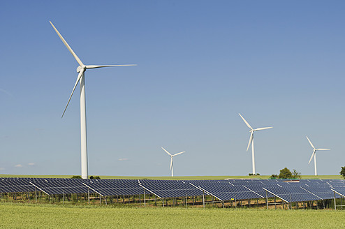 Germany, Saxony, View of wind turbine with solar panel - MJF000002
