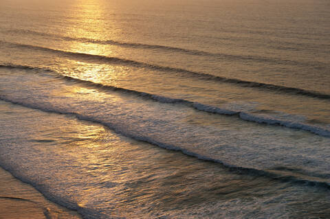 Portugal, Algarve, Sagres, View of Atlantic ocean with waves at dusk stock photo