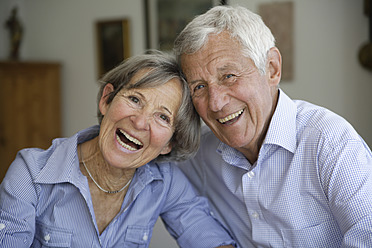 Germany, Bavaria, Senior couple smiling, portrait - TCF002564