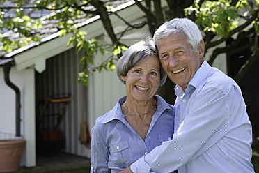 Germany, Bavaria, Senior couple smiling, portrait - TCF002581