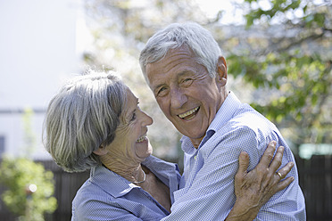 Germany, Bavaria, Senior couple smiling, close up - TCF002584