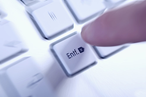 Young woman pressing key on keyboard, close up - TSF000359