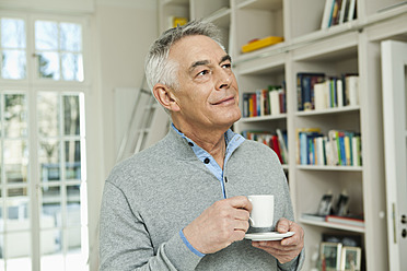Germany, Berlin, Senior man with coffee cup - FMKYF000004