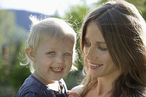 Germany, Bavaria, Mother and daughter smiling - TCF002706