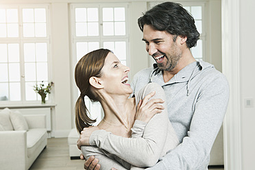 Germany, Berlin, Mature couple smiling - FMKYF000129