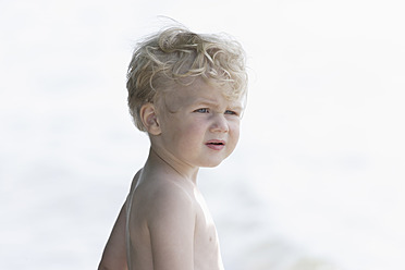 Germany, Bavaria, Boy looking away, close up - TCF002732