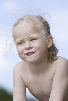 Germany, Bavaria, Girl looking away, smiling - TCF002781