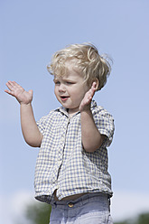 Germany, Bavaria, Boy clapping hands, close up - TCF002762