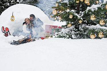 Austria, Salzburg County, Couple celebrating christmas in nature, smiling - HHF004268