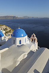 Greece, View of whitewashed church and bell tower at Oia - RUEF000953