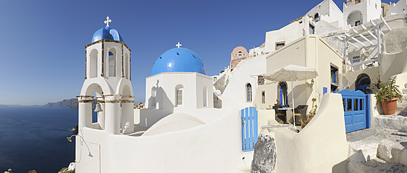 Greece, View of classical whitewashed church and bell tower at Oia - RUEF000965