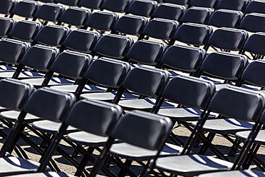 Austria, Salzburg, Empty chairs before event at Kapitelplatz - EJWF000037