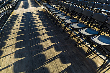 Austria, Salzburg, Empty chairs before event at Kapitelplatz - EJWF000063