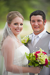 USA, Texas, Bride and groom smiling, portrait - ABAF000260