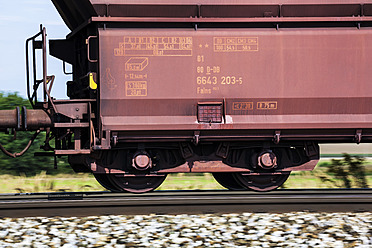 Austria, Freight train wagons on rails, close up - EJWF000123