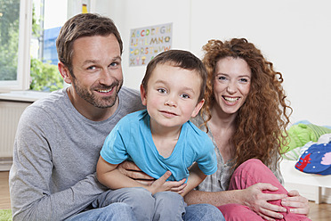 Germany, Berlin, Portrait of family at home, smiling - RBF000960