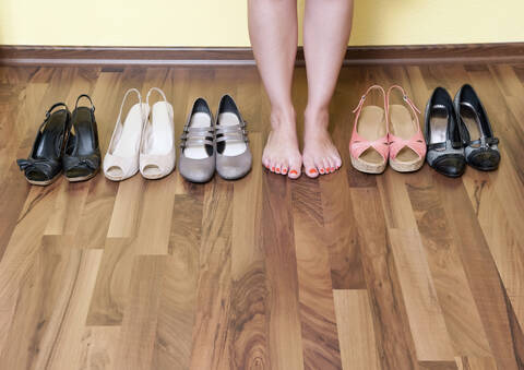 Germany, Berlin, Young woman feet with shoes, close up stock photo