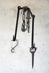 Spain, Work tool hanging on wall, close up - JMF000210