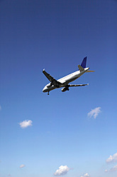 Germany, Berlin, Passenger plane flying in air at Tegel - JMF000232