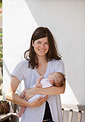 Germany, Bavaria, Mother holding baby girl - HSIYF000094