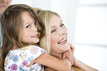 Germany, Mother and daughter smiling, close-up - RFF000007