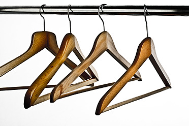 Fotografia do Stock: a lot of clothes hangers that are closely