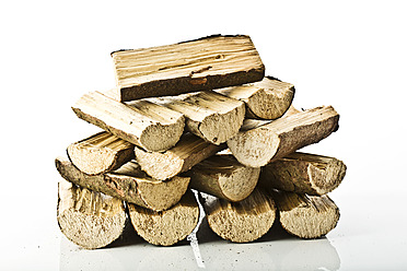 Close up of firewood on white background - MAEF005078