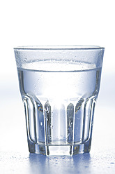 Glass of water on white background - ASF004649