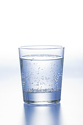 Glass of water on white background - ASF004647