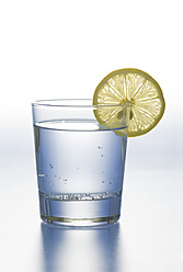 A Glass of Cold Water with Ice and Lemon on a Blue Background Stock Photo -  Image of isolated, object: 148203114