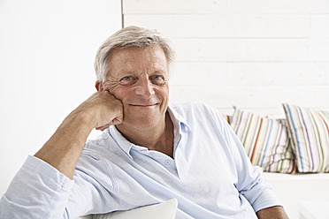 Spain, Senior man smiling, portrait - PDYF000117