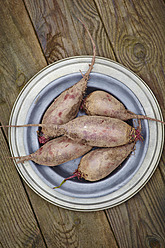 Beetroots in plates on wooden table - ECF000099