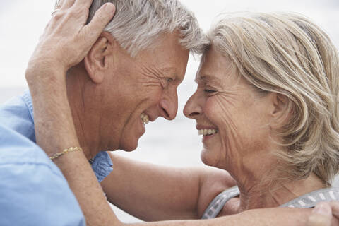 Spain, Senior couple looking at each other, smiling stock photo