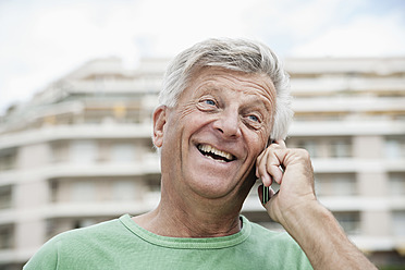 Spain, Senior man talking on cell phone - WESTF019106