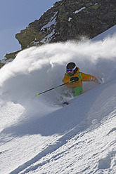 Austria, North Tirol, Mature man skiing - FFF001316