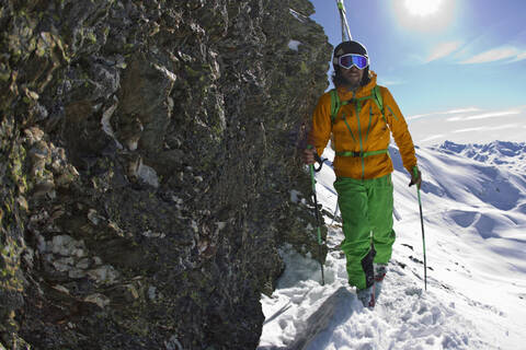 Austria, North Tirol, Mature man skiing stock photo