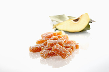 Pieces of quince jelly on white background - DIKF000033