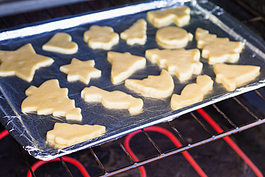 Various cookies shape on foil, close up - ABAF000569