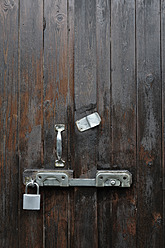 Germany, Bavaria, Wooden door with door lock - AXF000414