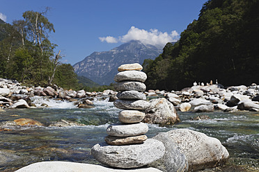 Switzerland, Stack of stone at Verzasca River - GWF002069