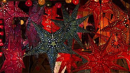 Germany, Star lamps seen in Christmas market - DJGF000016