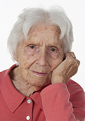 Portrait of senior woman against white background, close up - WWF002457