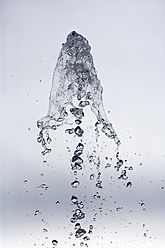 Splashing water against white background - TCF003166