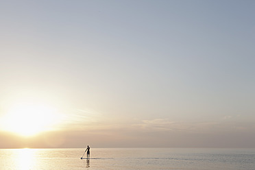 Germany, Schleswig Holstein, Man rowing on Baltic sea - DBF000222