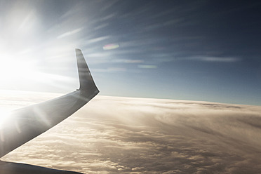 Aeroplane wing above cloud - DBF000231